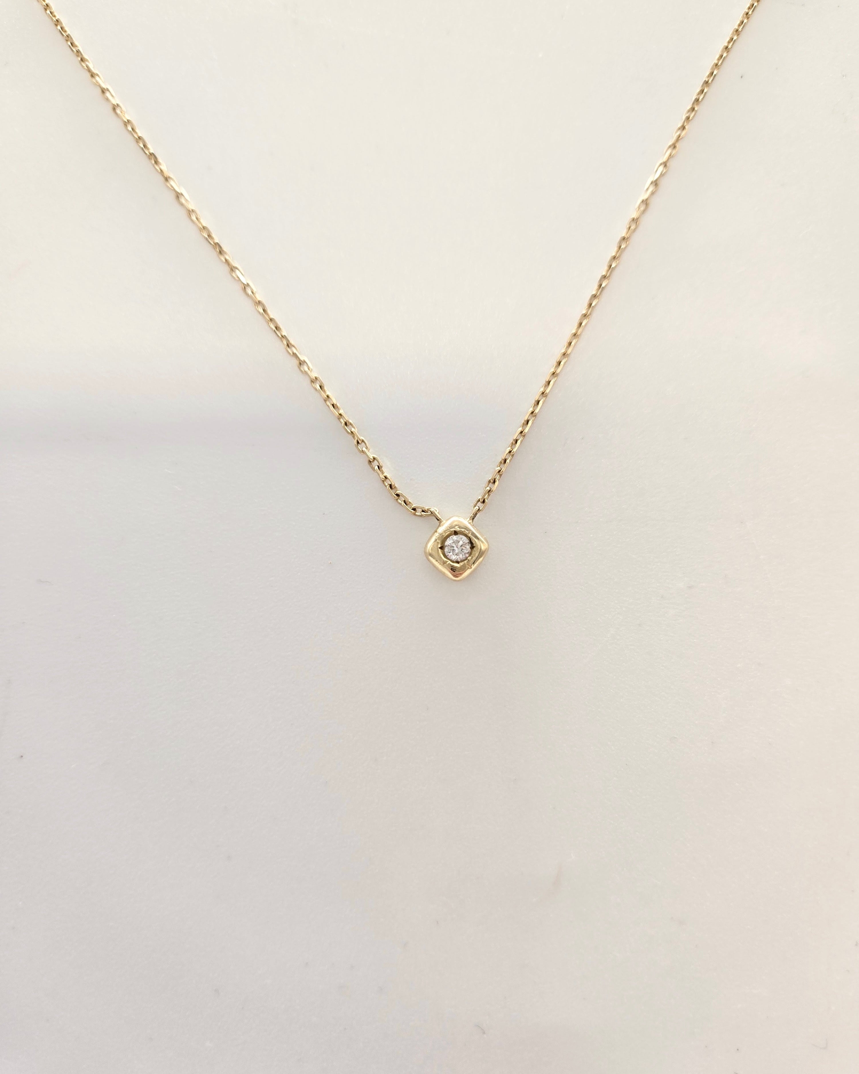 Pendentif diamant en or jaune 750 serti masse