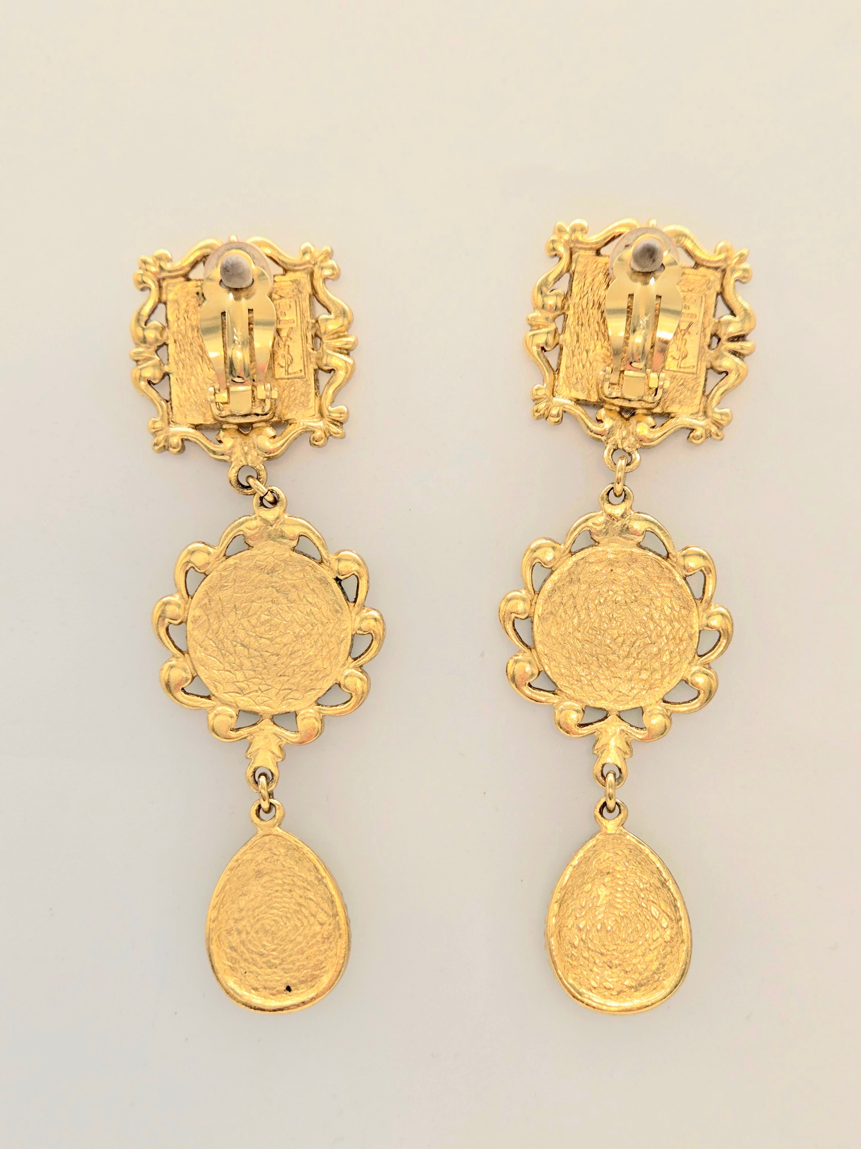 Boucles d’oreilles clips Yves Saint Laurent cadres bleu pendantes