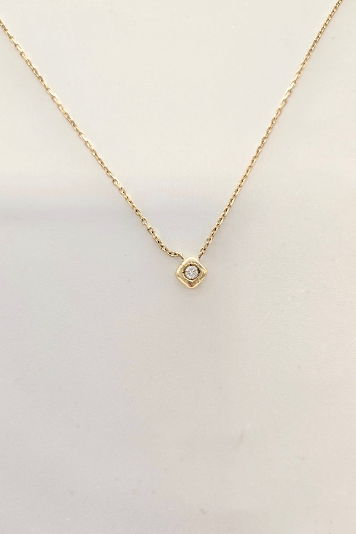 Pendentif diamant en or jaune 750 serti masse