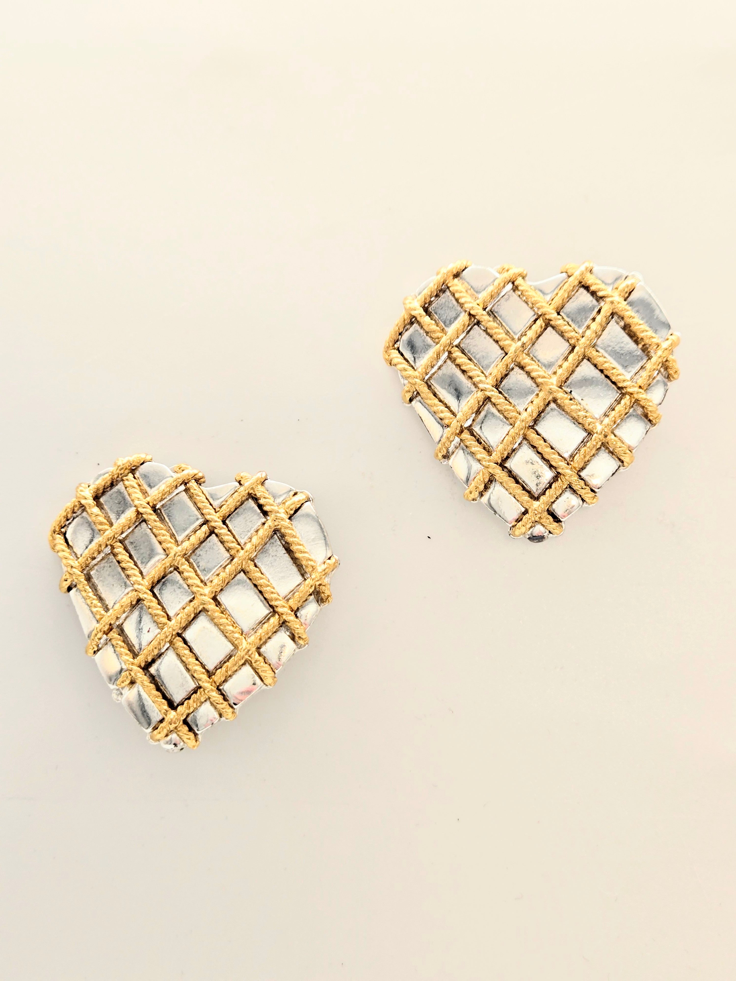 Boucles d’oreilles clips Yves Saint Laurent cœur argent